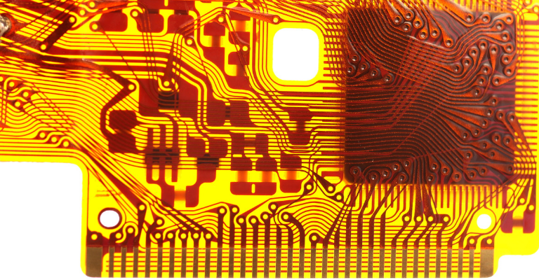 a close up shot of yellow pcb flexible circits