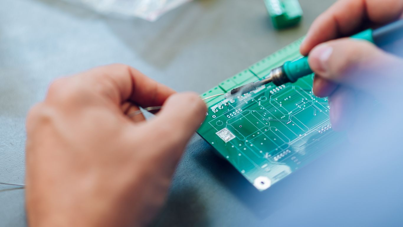 Electronics Engineer Hands Working in a Workshop