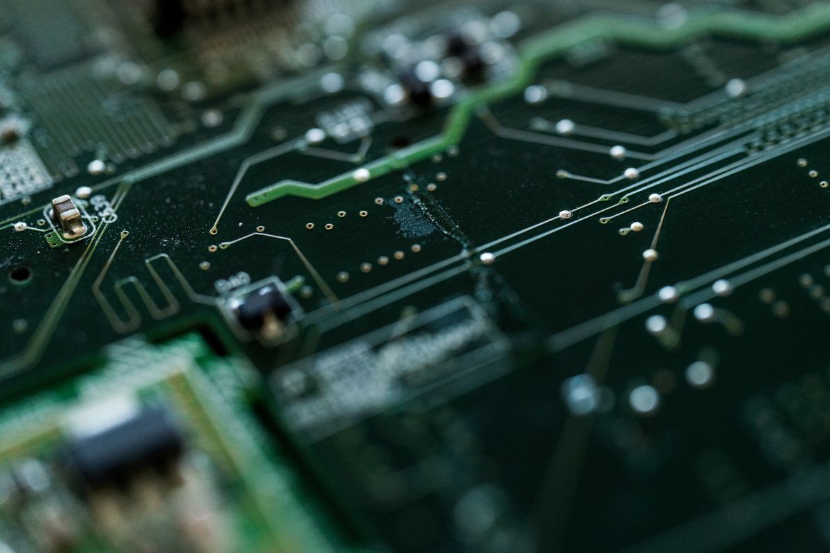 Close-up of circuit board inside a PCB Manufacturing and Assembly facility