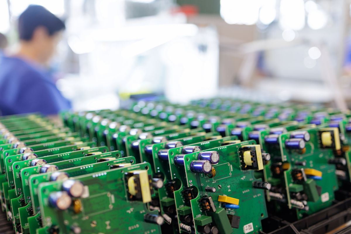 Row of assembled pcbs in domestic manufacturing facility